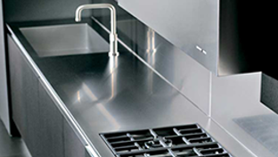 Stainless steel kitchen equipment and surfaces